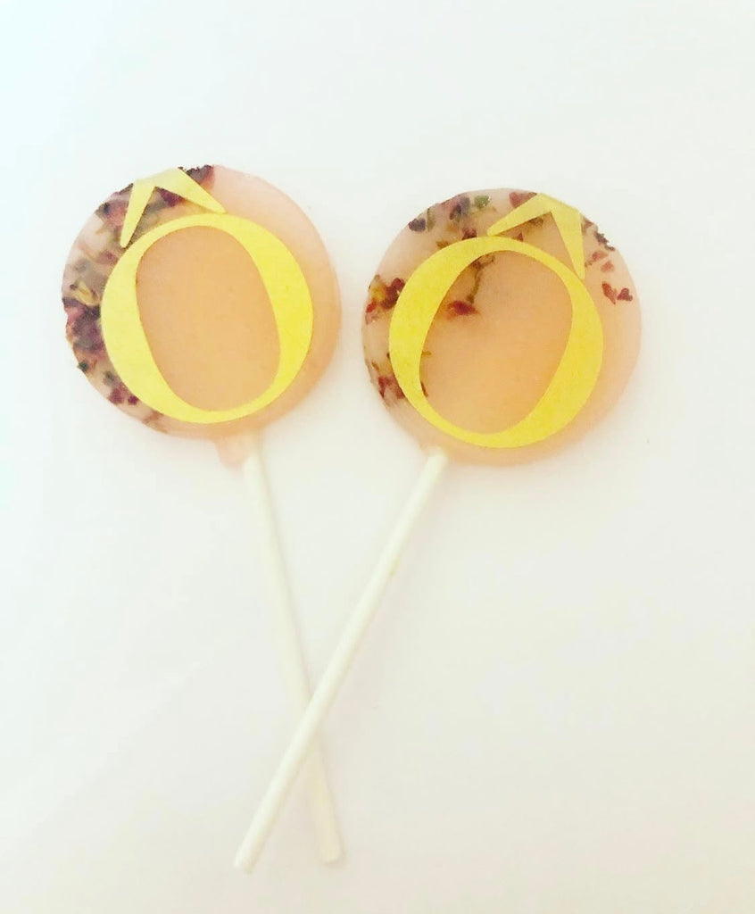 Logo overlay branded floral lollipops