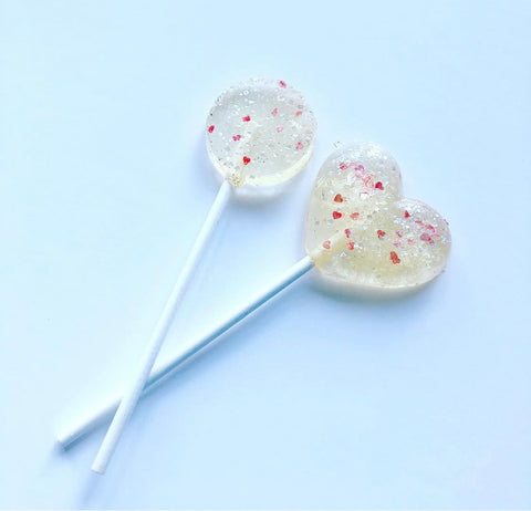 Lecca-lecca con granella a forma di cuore scintillante