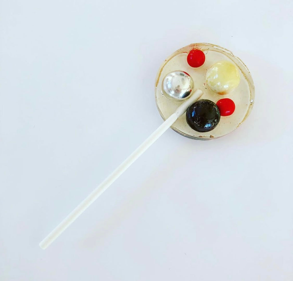 Reindeer poop sprinkle lollipop