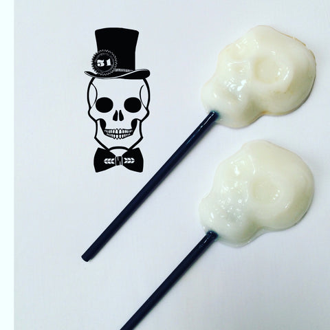 White skull shaped lollipops